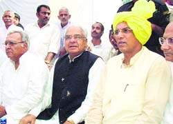 HJC leader and former Chief Minister Bhajan Lal at a public meeting in Rohtak on Monday.