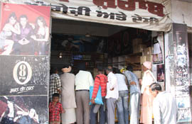 Customers thronging a liquor vend in Bathinda as its owner cleared stock on Tuesday, the last day of the contract.