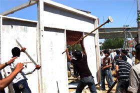 Villagers ransack an under construction liquor vend near Sahara Mall in Gurgaon