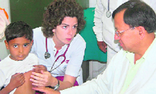 Neora, a medical student from the Netherlands, working with Doon Hospital doctors.