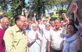 Residents of Laxman Chowk hold protest.