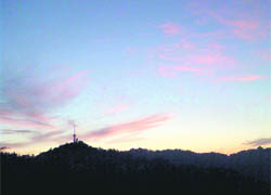 A view of the sunset over the Kamna Devi Hill in Shimla.