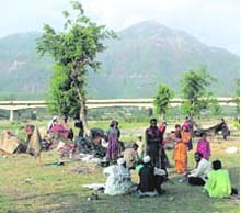 Gujjar families on the banks of the Assan river in Vikas Nagar