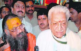 Vishwa Hindu Parishad leader Ashok SInghal (R) with Swami Hansdas after attending a meeting of party workers in Haridwar