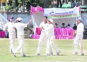 LIC team bowler Naman Sharma celebrates the dismissal of Sanjeev at the 2nd Uttarkhand Cup in Dehradun