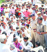 A view of the blockade staged against the murder of a youth on the NH-71 near Titoli village on Wednesday.