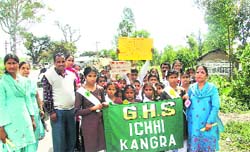 School children creating awareness among people regarding proper sanitation on the first day of the Total Sanitation Campaign at Kangra