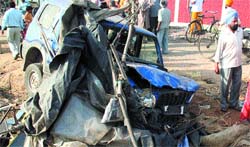 The mangled remains of a Scorpio, which ploughed into labourers sleeping along the road in Jalandhar on Wednesday. 