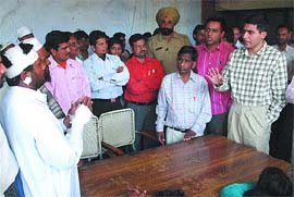 SP Satinder Singh pacifies the complainants in Jalandhar on Wednesday. 
