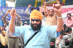 Members of the National Federation of the Blind hold a protest in Sector 34, Chandigarh, on Thursday.