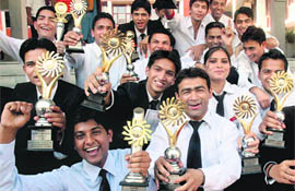 Students of the Chandigarh Institute of Hotel Management, Sector 42, after receiving prizes at a function in Chandigarh on Thursday.