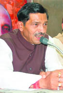 Uttarakhand BJP chief Bachi Singh Rawat addresses mediapersons  in Dehradun on Thursday. 