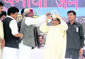 BSP chief Mayawati adds another silver crown to her collection that was presented to her by party workers at a political rally at Una