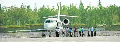Passengers disembark from a New-Delhi-Dehradun flight at Jolly Grant airport.