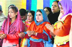 Women pray on the occasion of Ramnavami in a temple in Srinagar on Friday