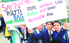 Schoolchildren take out a march against the use of polythene in Srinagar.