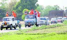 A cavalcade of vehicles moves around villages along a polluted Chitti Bein in Jalandhar on Friday. 