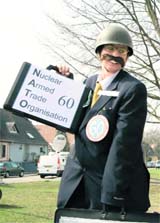 An anti-NATO protester sings the happy birthday to NATO song in a suburb of Strasbourg on Friday. NATO leaders, including US President Barack Obama, will meet in Strasborg, France and the German town of Baden-Baden and Kehl for a two-day summit to mark the 60th anniversary of the military alliance.