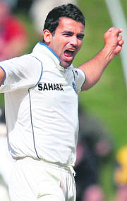 Zaheer Khan celebrates the wicket of Tim McIntosh during the second day of the final Test.