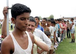 Boys line up at a recruitment rally for the Boys' Sports Company being organised by the Army in Bathinda on Sunday