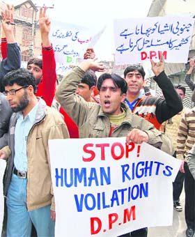 Activists of the Democratic Political Movement protest the house arrest of APHC chairman Syed Ali Geelani in Srinagar