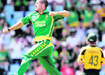 Wayne Parnell, left, celebrates after dismissing Nathan Bracken.