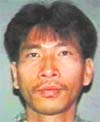 This photo released by the Binghamton Police Department on Saturday shows Jiverly Wong, the gunman who killed 13 persons in a rampage at an immigrant community centre. He then committed suicide. He was wearing body armour, indicating he was prepared to battle with law enforcers, the police chief said.
