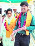 Sharat Sabharwal, Indias new High Commissioner to Pakistan, comes out with his wife after paying obeisance at Durgiana Temple in Amritsar