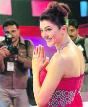 Model and actor Sushmita Sen presented a rosy picture in her fuchsia dress
