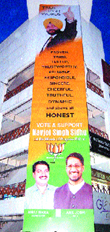 A billboard of BJP MP Navjot Singh Sidhu installed on a government building in Amritsar.
