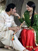 Actors Harbhajan Mann and Neeru Bajwa during the shooting of a movie titled Heer Ranjha at Gobindpura village in Bathinda district on Tuesday. 