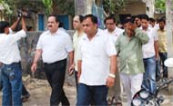 Pravins father and relatives outside the post-mortem house in Gurgaon