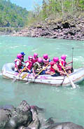 RIMC cadets rafting on the river Ganga. 