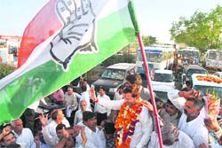 Traffic on the GT road comes to a standstill as Congress workers line up to welcome sitting MP and Congress nominee Dr Arvind Sharma in Karnal
