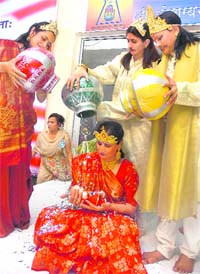 Devotees enact a scene in celebration of Mahavir Jayanti in Jammu