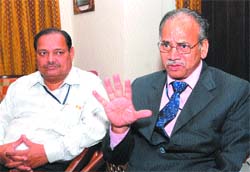 R.V. Gawai, General Manager RBI, along with Manager Jaipal Singh, addresses mediapersons in Jalandhar 