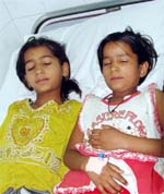 The children who fell ill after consuming poisonous fruit, undergo treatment in a private hospital in Gurgaon on Wednesday.