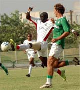 Players of Sagaocar SC and ONGC teams participate in a football match at Tau Devi Lal Stadium in Gurgaon on Wednesday