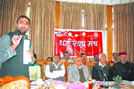 Members of the Vishwa Hindu Parishad interacting with mediapersons at Shimla on Wednesday. 