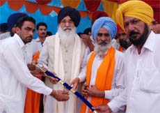 The Congress dissidents, who joined SAD, honouring CM Parkash Singh Badal at Phoos Mandi in Bathinda district on Thursday.