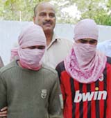 The Gurgaon police on Thursday held two criminals allegedly involved in a loot case in the city