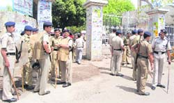Police deployed outside DAV PG College following a clash in Dehradun on Thursday. 