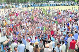 Auto-rickshaw drivers of Chandigarh, Mohali and Panchkula protest against the ban on the plying of auto-rickshaws without valid permits, at Parade Ground in Sector 17, Chandigarh
