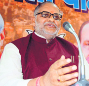 BJP Campaign Committee chairman Manoharkant Dhyani addresses mediapersons in Dehradun on Saturday.