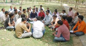 BRAINSTORMING: Parents of schoolchildren meet at Sector-45 park in Gurgaon to plan their strategy to oppose the rise in fee by private schools