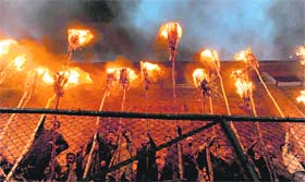 Muslims hold mashals to celebrate the slaying of demon at Aishmuqam (Anantnag)