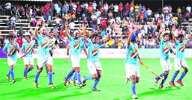 Indian team celebrates win over Malaysia.  AFP 