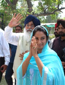 Harsimrat Kaur Badal, candidate for Bathinda Lok Sabha seat, along with Chief Minister Parkash Singh Badal on her way to file her nomination papers at the deputy commissioner's office in the Mini-Secretariat, Bathinda