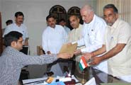 BJP nominee Ram Chander Bainda files his nomination papers in Faridabad.