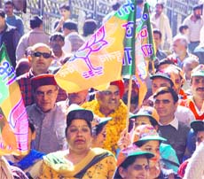 Varinder Kashyap, the BJP candidate from Shimla, during election campaign at Shimla on Monday.